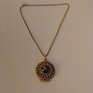 Black and gold pendant necklace